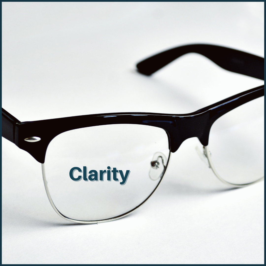 Pair of glasses with "clarity" in view